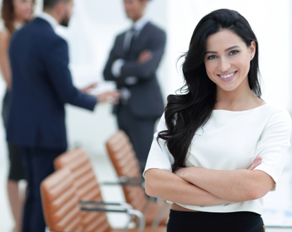 smiling executive woman in the boardroom
